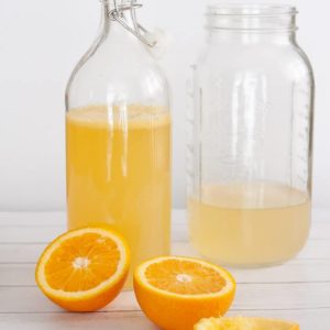 Orange Cardamom Kombucha in bottle